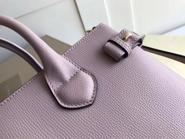 B**rry the medium banner in leather and house check