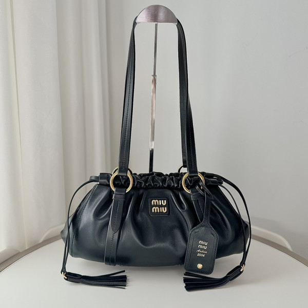 M*um*u joie nappa leather bag